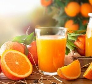 Jus d'orange avec oranges fraîches